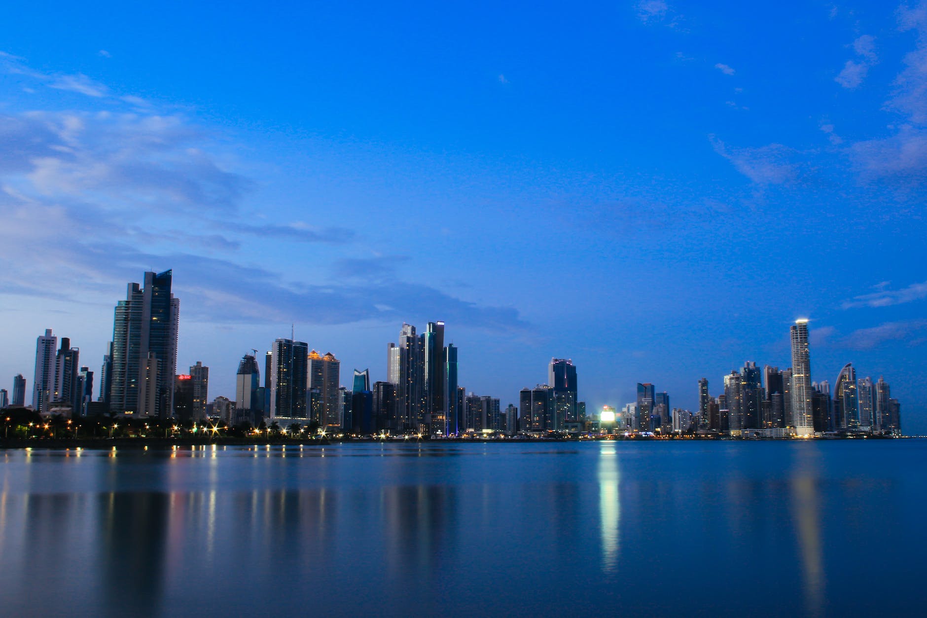 high rise buildings under the blue sky